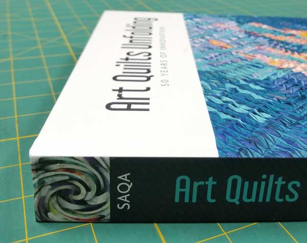 <i>Art Quilts Unfolding</i> - spine