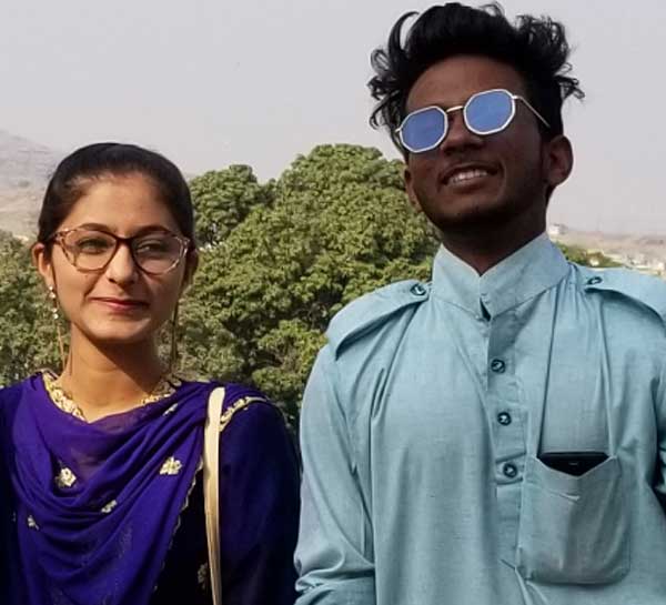 duo in sari and sunglasses